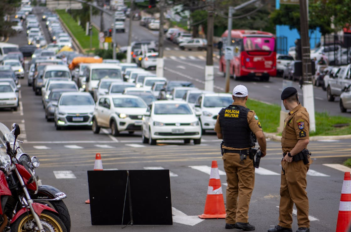 Policemen Coordinating the Traffic in City 